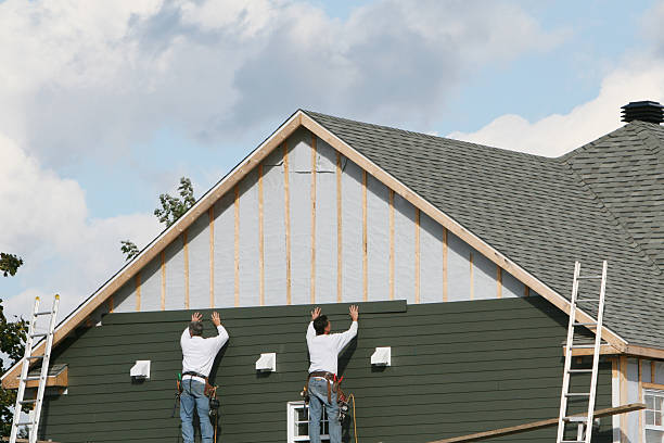 Professional Siding technician working in Brighton, CO